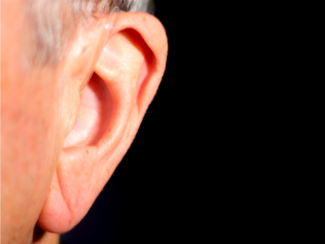 Close up image of hearing aid in ear